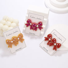 Load image into Gallery viewer, Beaded Holiday Bow Earrings