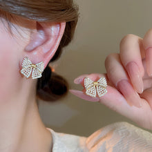 Load image into Gallery viewer, Pearl &amp; Sparkle Bow Studs

