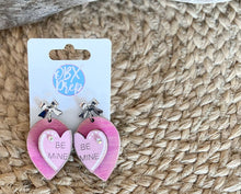 Load image into Gallery viewer, Hand-Painted Valentine&#39;s Day &quot;Be Mine&quot; Conversation Heart Earrings with Silver Bow Stud Toppers.
