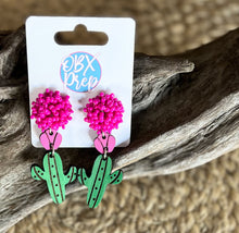 Load image into Gallery viewer, Handmade Hand-Painted Cactus Earrings – Southwestern Charm with a Pop of Pink! 🌵✨.
