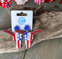 Load image into Gallery viewer, Patriotic Red White Blue Bull skull Seed Bead Dangle Earrings.
